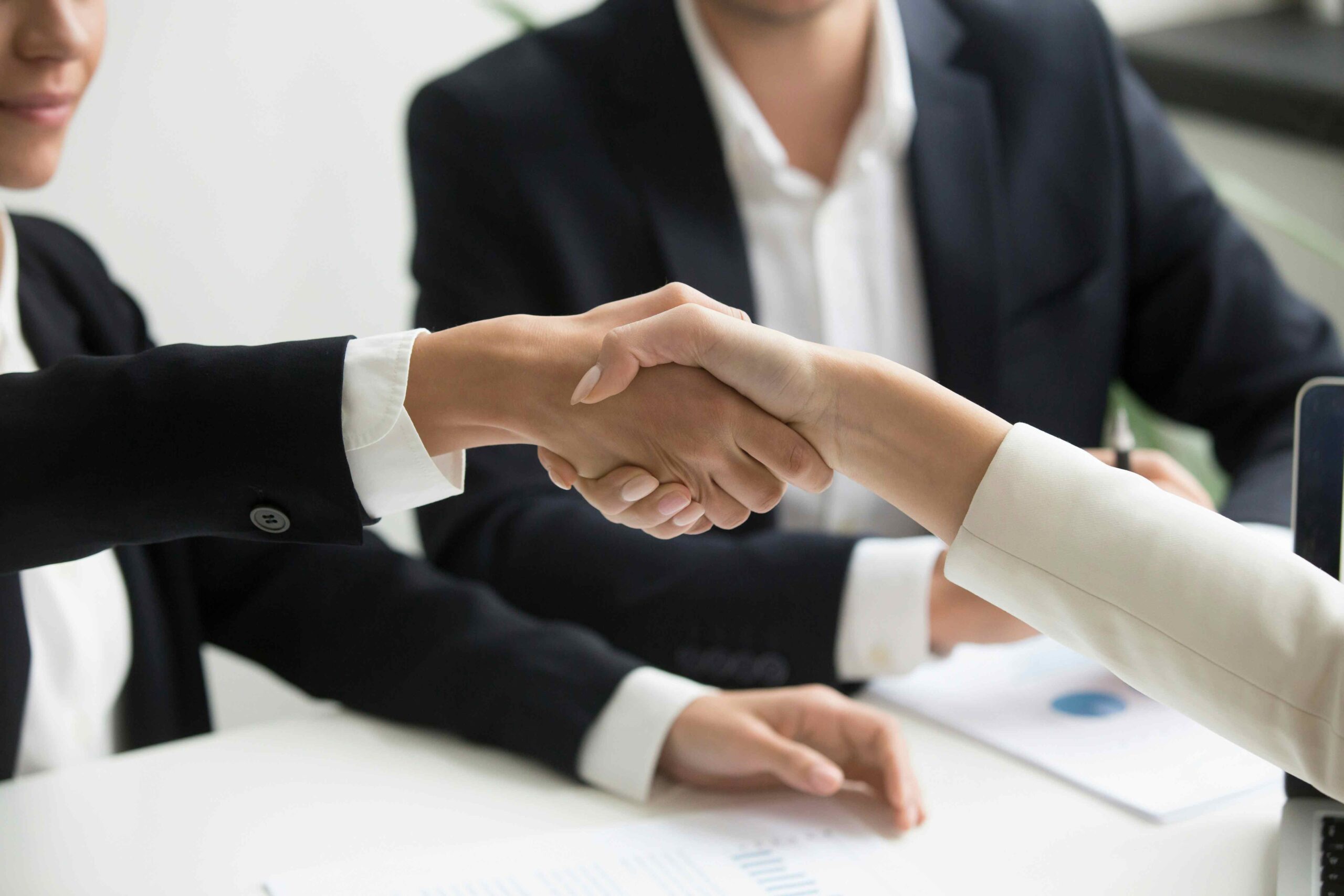hand shaking between recruiter and employee